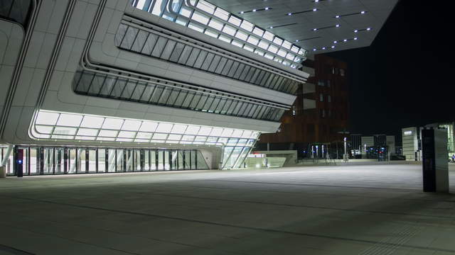 Main building at the new university of economics Vienna at night – Hyperlapse
