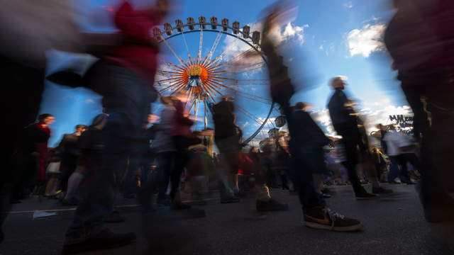 Ferris Wheel with Stream of People