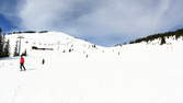 Time lapse clip - Ski Run with Skier and Chairlift