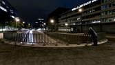 Time lapse clip - Man standing on a bridge