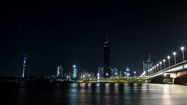 Donau City and Reichsbrücke Vienna at night – pan