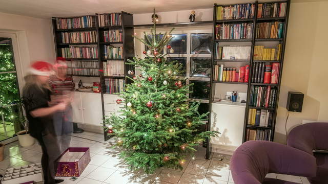 Decorating the christmas tree on christmas eve