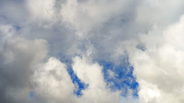 Blue Sky with Dancing Clouds