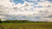 Time lapse clip - Field with Wind Turbine and Allianz Arena