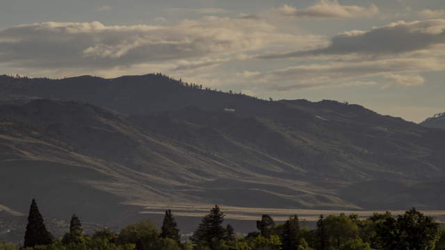 Time lapse clip - A Rainy Golden Sunset in the Mountains