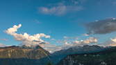 Time lapse clip - Landscape Mountains Day to Night with Moon